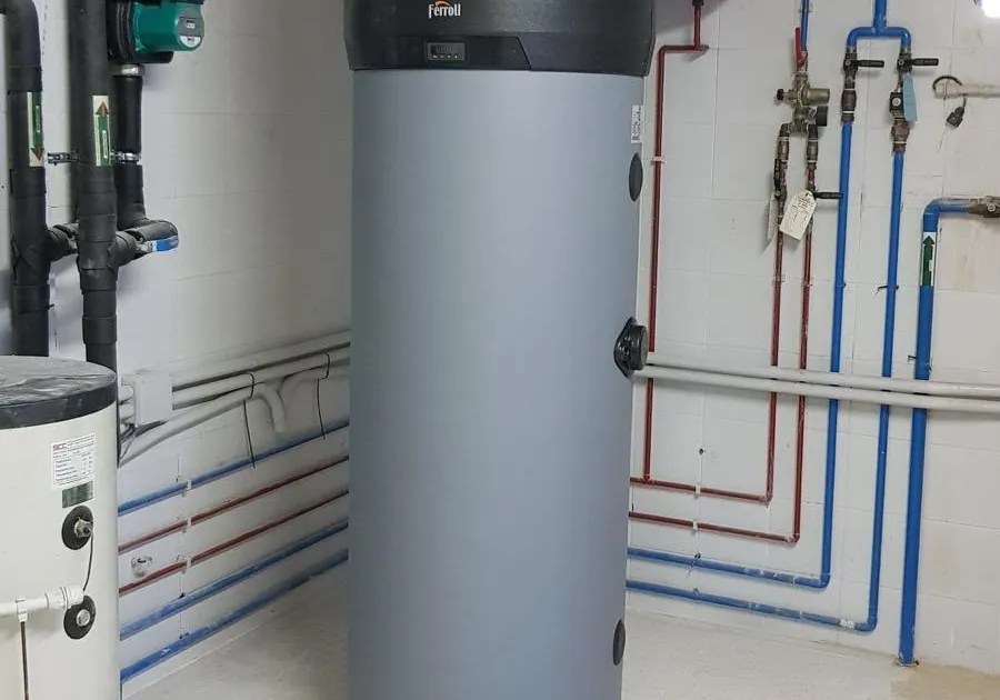 Plant room with a cylinder and pipework